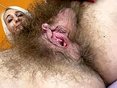 Mature amateur mommy shows off her hairy bush and gaping pussy