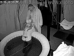 Amateur blonde wife enjoys a big cock in the hot tub