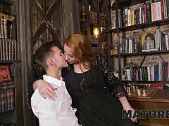 Redhead MILF with tattoos enjoys intense sex