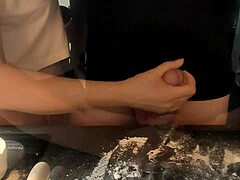 Mature woman prepares penis with flour for intimate dinner