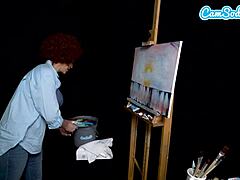 Ryan Keelys cosplay als Bob Ross maakt haar opgewonden tijdens een schilderles op webcam